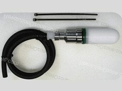 A picture of some tools and wires on the floor.